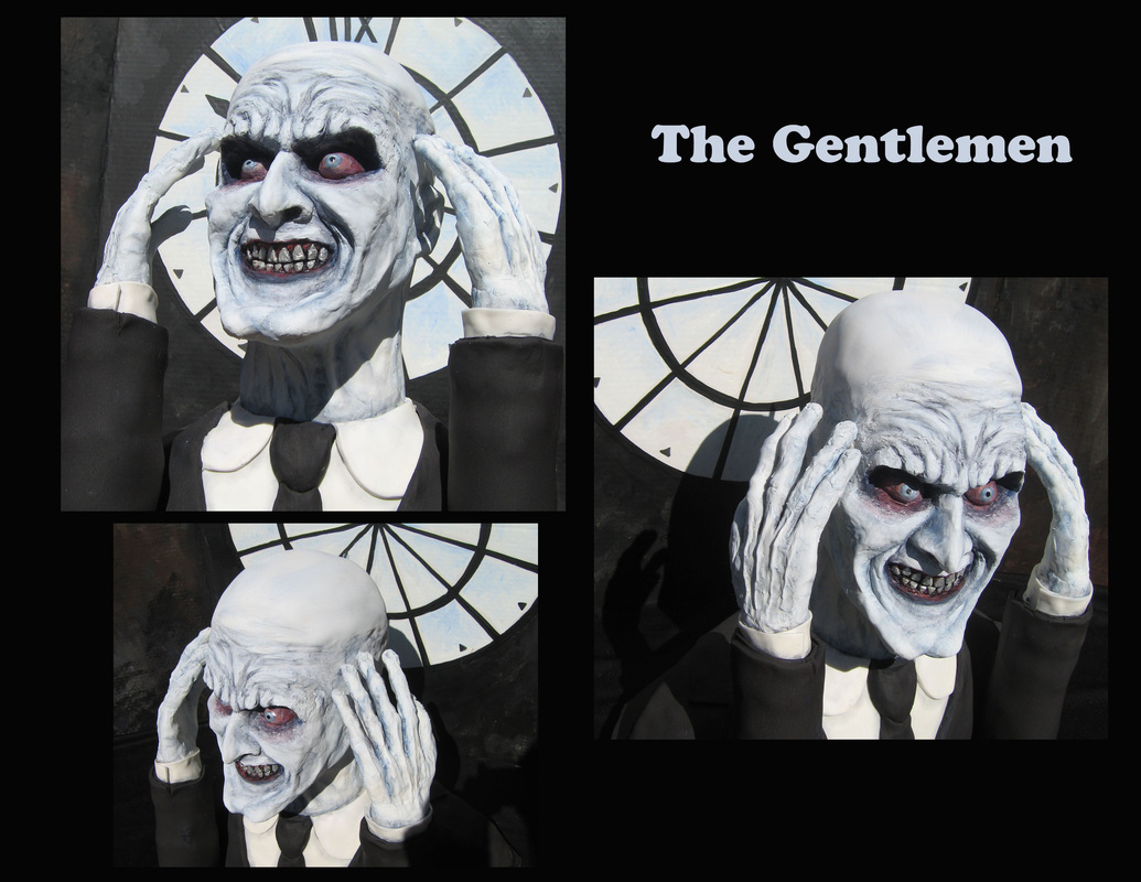 A collage of three photos features a sculpted cake of a pale-skinned monster with red eyes and sharp teeth, dressed in a formal black suit and tie, clutching its head in front of a large clock face, with the text "The Gentlemen" displayed in the upper right corner.