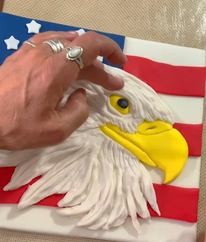 Small black fondant pupil added to the eagle eye.