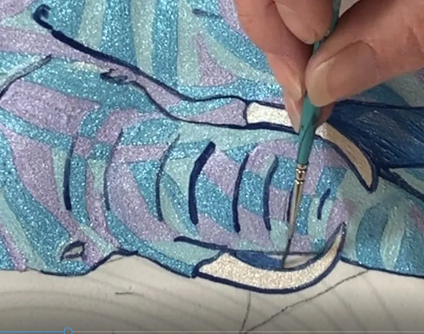 Adding dark blue detail to the elephant painting.