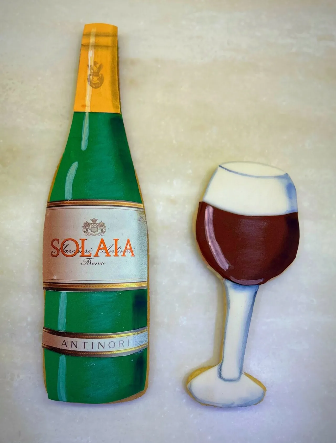 Decorative wine bottle and wine glass cookies