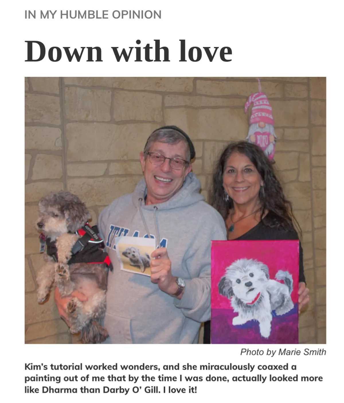 Newspaper column Down With Love featuring a couple holding a dog and a painting of the dog.