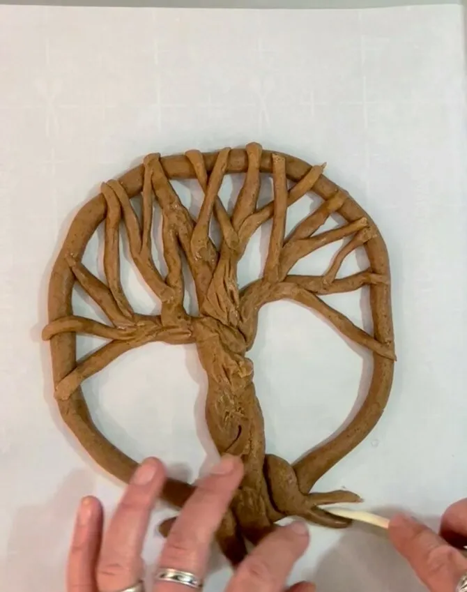 Adding bark texture details to the gingerbread tree.