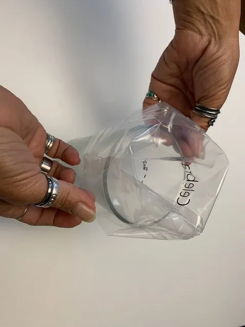 Filling a pastry bag placed over a glass