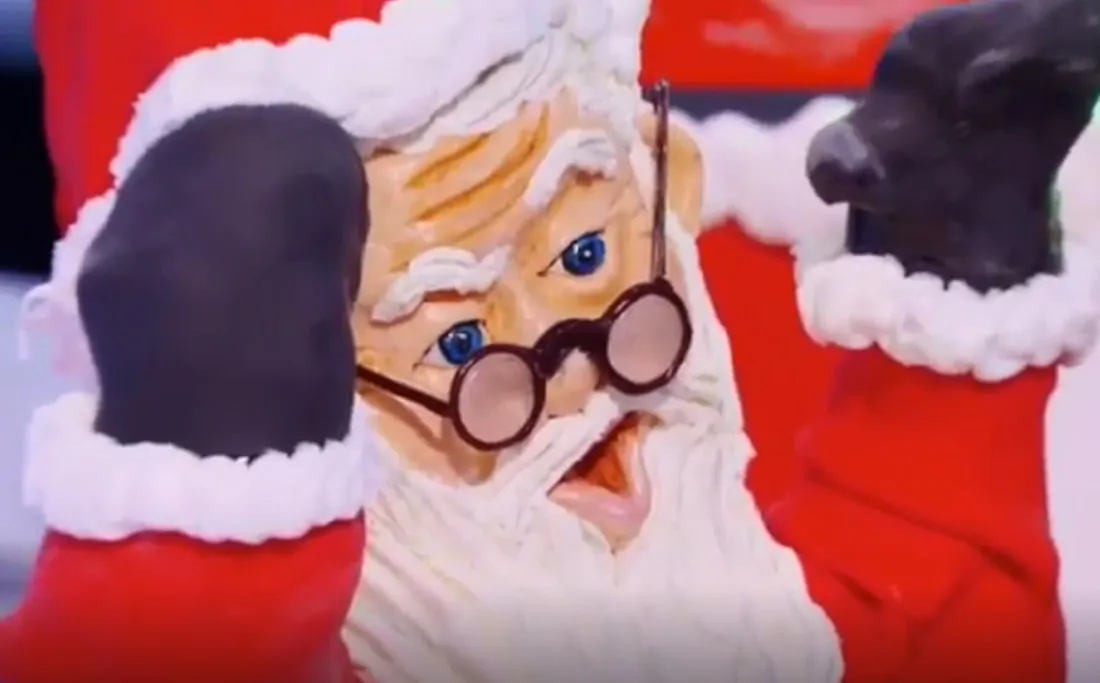 Close-up of a sculpted Santa Claus figure on Holiday Wars.