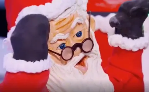 Close-up of a sculpted Santa Claus figure on Holiday Wars.