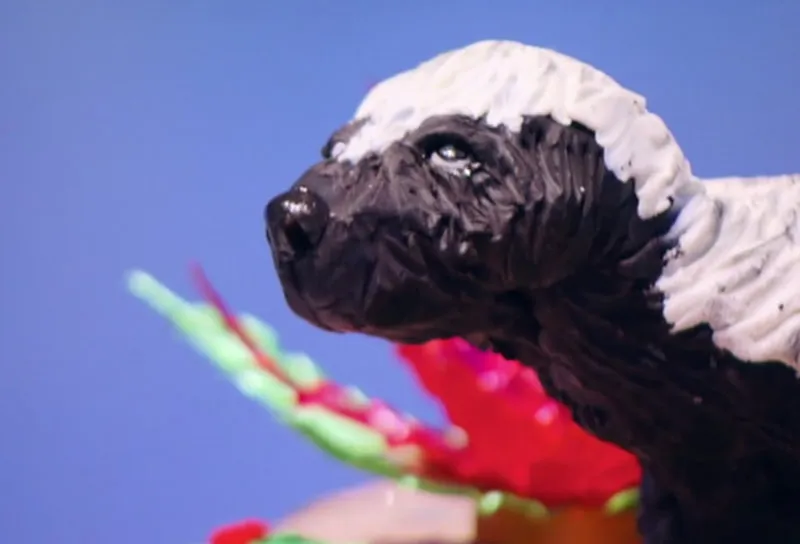 A sculpted skunk figure on Holiday Wars.