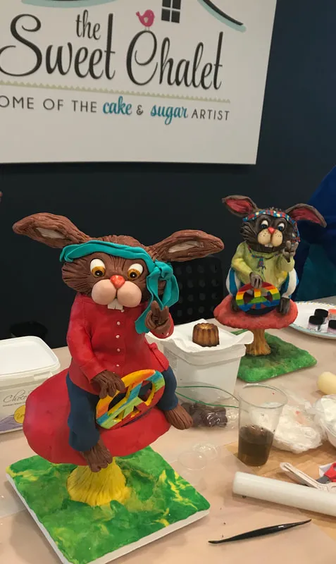 Two sugar art rabbits on display at The Sweet Chalet.