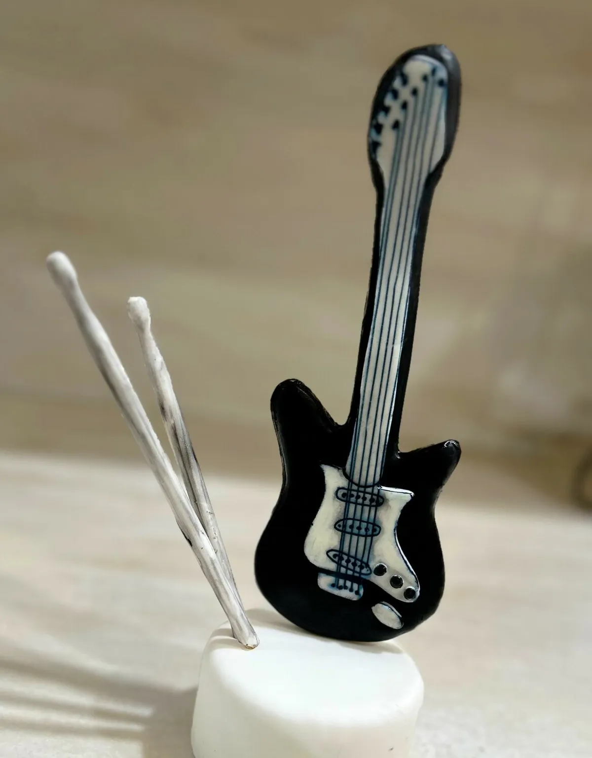 Fondant-covered musical instrument cookies