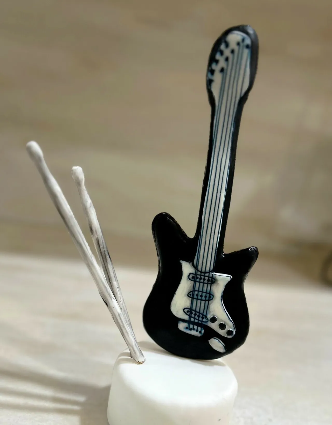 Fondant-covered musical instrument cookies