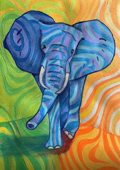A colorful painted elephant design on edible paper with blue and purple stripes on a vibrant background