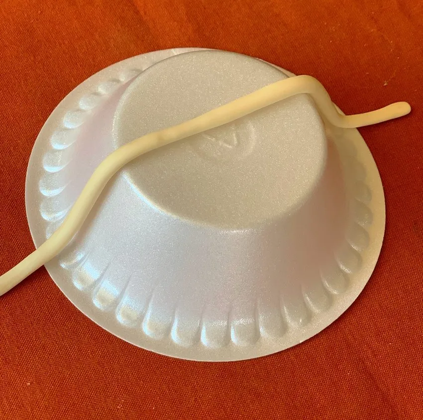 Rolling modeling chocolate into long strips