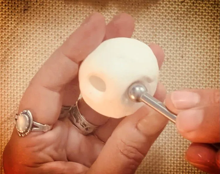 Creating eye sockets in the bear head with a ball tool.
