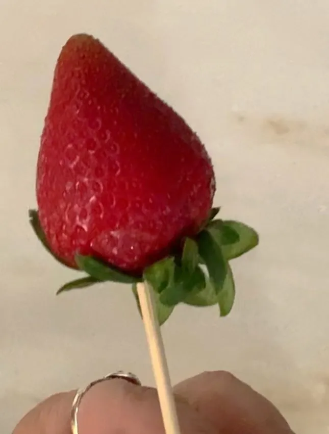 Strawberry on a wooden skewer